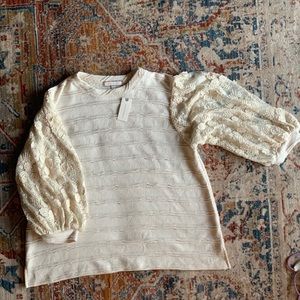 Ivory blouse with lace sleeves. New with tags